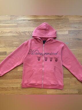 Travis Scott Coral Pink Full-Zip Hoodie with Script & Skull Motifs